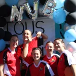 Equipe devant le stand photo des NVB Games