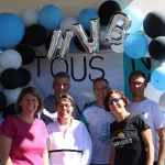 Equipe devant le stand photo des NVB Games